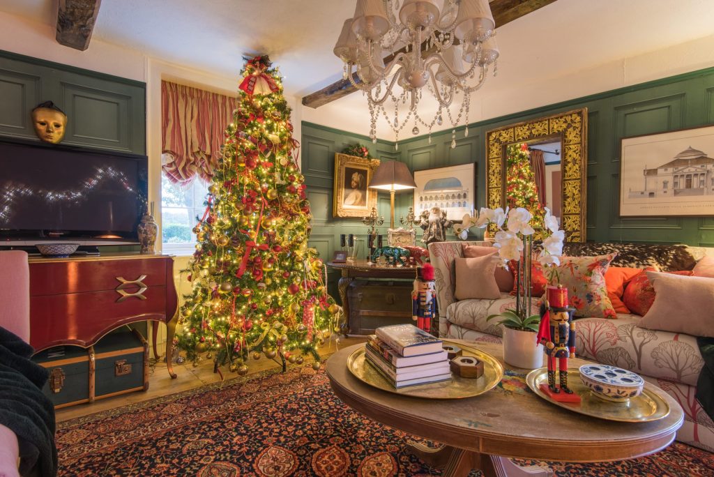 An image showing a holiday home in Brighton, UK, decked out with a Christmas Tree and Christmas decorations